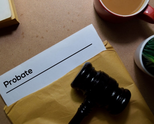 Probate in brown envelope and judges gavel. Justice and Law Concept